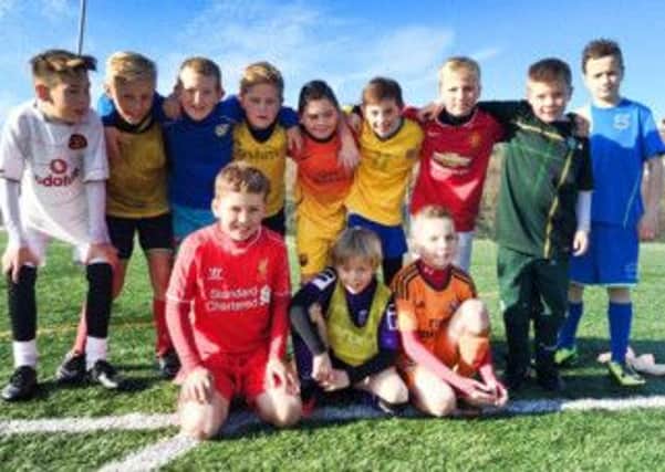 Youngsters at a Morecambe FC soccer school.