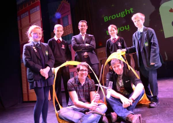 Morecambe High School pupils Jason Dixon and Millie Wattam and Our Ladys Catholic College pupils Caitlin Kelly and Joseph Murphy at the Science Show at The Grand  with Ian Haines, technical and safety manager at Heysham 2 power station, and performers Nic Harrigan and Simon Watt.