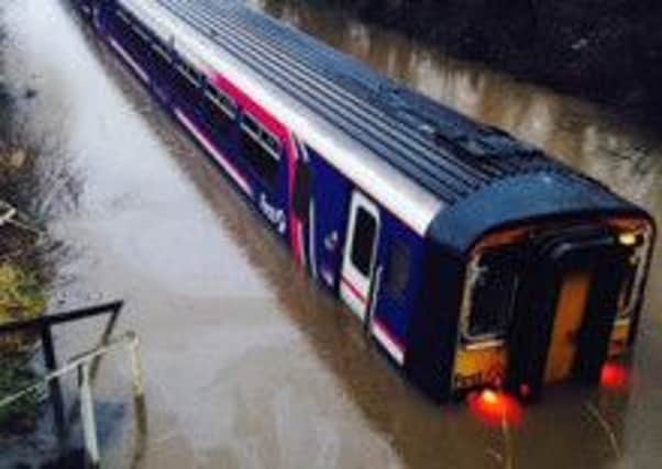 Passengers were delayed on New Year's Day after flooding on the railway line.