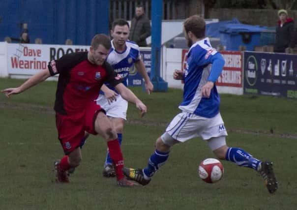 Sam Bailey and Garry Hunter battle for the ball against Bamber Bridge. Picture: Paul Vause