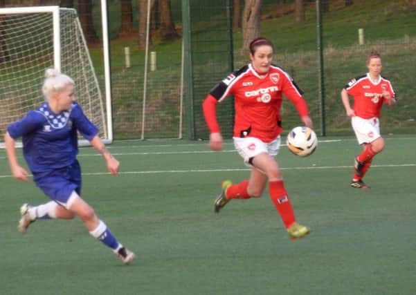 Laura Marshall charges forward for Morecambe Ladies against Stockport County.
