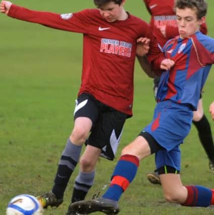 Carnforth High School have reached the last 16 of the English Schools FA Cup, and played their game to progress to the quarter-finals against New Minster from Morpeth.
Action from game, Carnforth in pale blue and claret shirts.  PIC BY ROB LOCK
14-1-2015