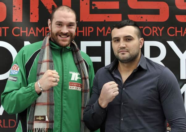European and WBO International Heavyweight Champion Tyson Fury (left) and Christian Hammer following a press conference at Fredericks Restaurant, London. Picture: Nick Ansell/PA Wire