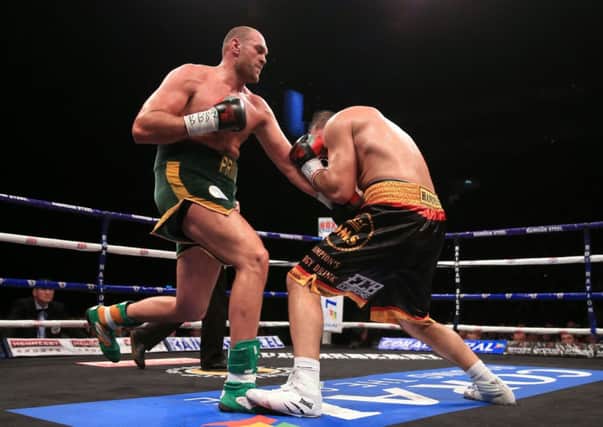 Tyson Fury in action against Christian Hammer. Picture: Nick Potts/PA Wire