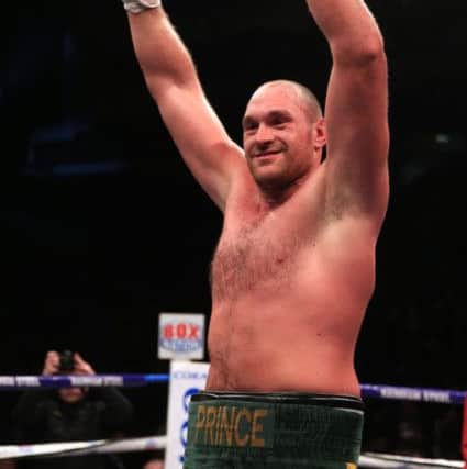 Tyson Fury celebrates beating Christian Hammer. Picture: Nick Potts/PA Wire