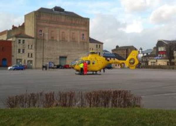 The ambulance landed in the car park at Morecambe's Winter Gardens.Picture: Gary Riley.