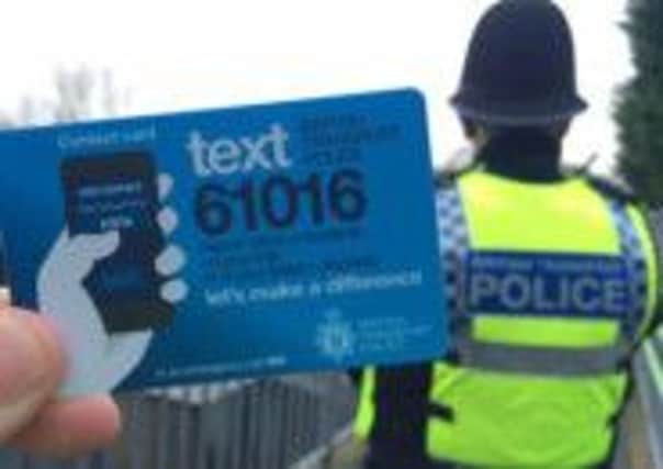 BTP officers will be handing out cards at Lancaster railway station to publicise their crime reporting text number.