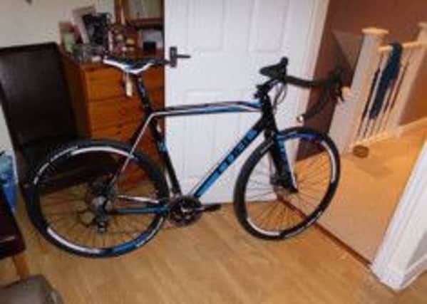 The black and blue CUBE cross race disk 2014 model which was stolen from Teesdale, Galgate over the weekend.