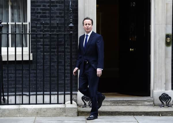 Prime Minister David Cameron leaves Downing Street. Photo: Andrew Matthews/PA Wire.