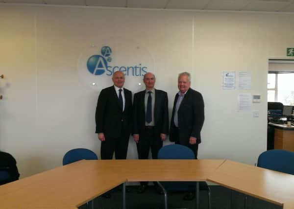 Secretary of State for Work and Pensions Iain Duncan Smith, Chief executive of Ascentis, Phil Wilkinson and Eric Ollerenshaw, parliamentary candidate for Lancaster and Fleetwood for the Conservative Party, during the visit to Ascentis on Lancaster Business Park.