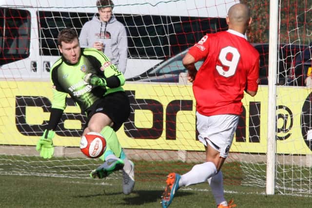 Mike Hale saves from Salford City's Danny Webber. Picture: Gareth Lyons
