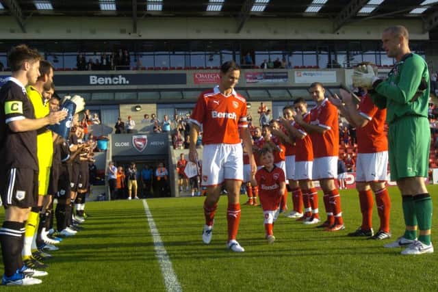 Stewart Drummond gets a guard of honour from Morecambe and Preston players ahead of his testimonial.