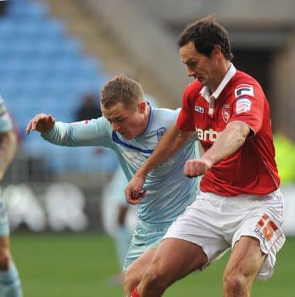 Stewart Drummond battles against Coventry in the FA Cup back in 2012. Picture: PA