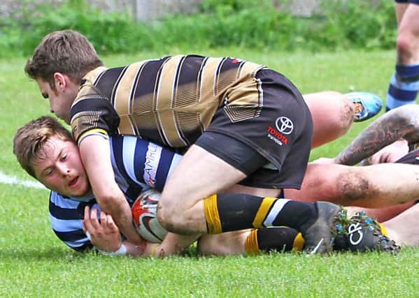 Dan Helme crashes over to score for the Heysham Atoms against Hindley. Picture: Tony North