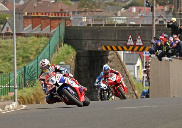 John McGuinness leads Keith Amor and Dean Harrison in Portrush. Picture: Rod Neill