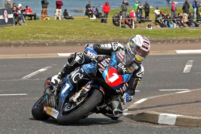 John McGuinness rounds the York Corner hairpin before the 200mph run to Coleraine. Picture: Rod Neill