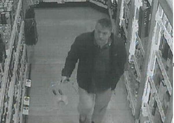 Police want to speak to this man in connection with the theft of alcohol from Booths.