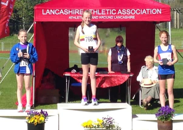 Kirsty Hamilton tops the podium after becoming a Lancashire County Champion.