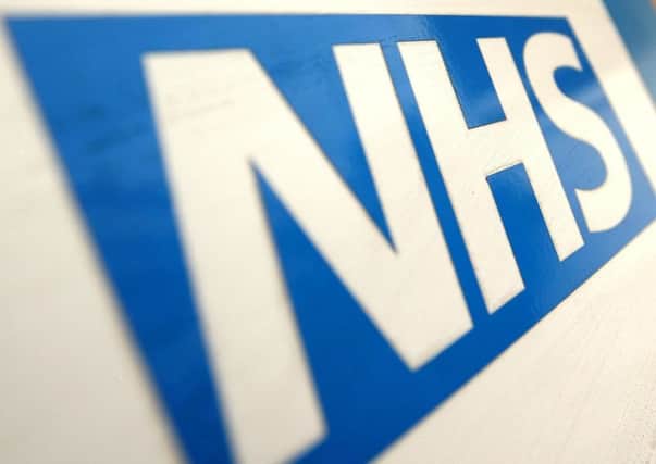 File photo dated 07/12/10 of an NHS logo, as although there is no Health Bill in the Government's agenda for the coming year, the Queen's Speech included promises for far-reaching change to the NHS in England, involving the creation of a "truly seven-day NHS" and an £8 billion boost in state funding by 2020.PRESS ASSOCIATION Photo. Issue date: Wednesday May 27, 2015. See PA story POLITICS Speech Health. Photo credit should read: Dominic Lipinski/PA Wire