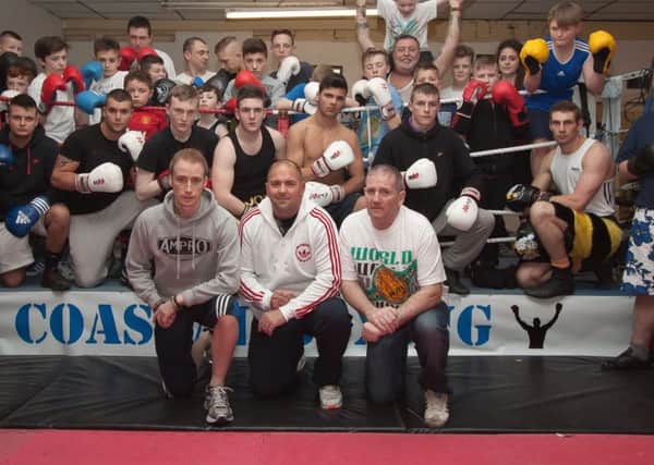 Frank Harrington (front right) with trainers and boxers at the Red Rose Community Centre.