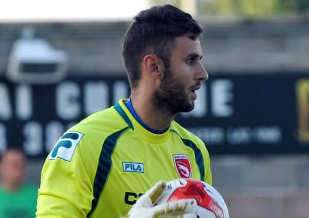 Andreas Arestidou has been released by Morecambe.