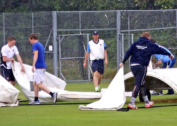 The covers are brought on as Lancaster and Netherfield's T20 final is rained off. Picture: Tony North