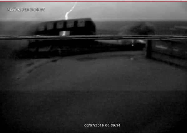 CCTV cameras captured the moment a school building was hit by lightning.