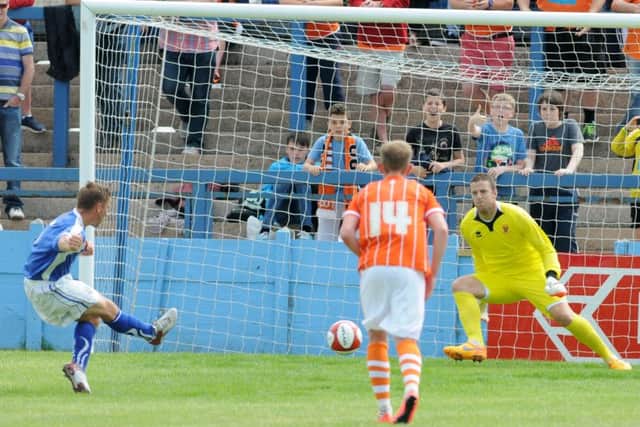 Ryan Winder scores from the penalty spot for Lancaster City.