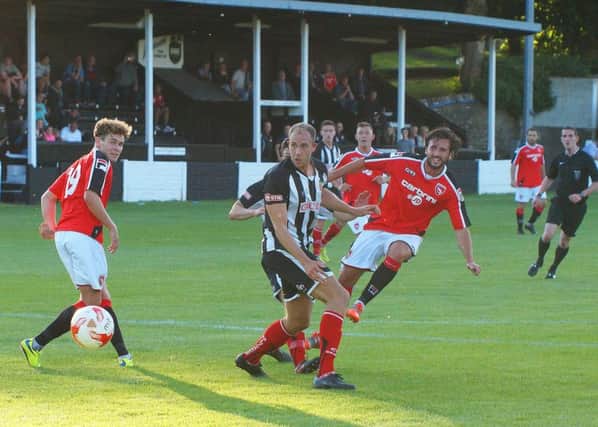 Aaron Wildig opens the scoring for Morecambe at Kendal.  Picture: Richard Edmondson
