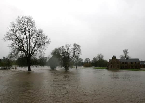 A House in Brougham in Cumbria after a river burst its banks, as forecasters warn that the downpour is set to continue in northern England, north-west Wales and western Scotland. PRESS ASSOCIATION Photo. Picture date: Thursday November 19, 2009. See PA story WEATHER Storm. Photo credit should read: Peter Byrne/PA Wire