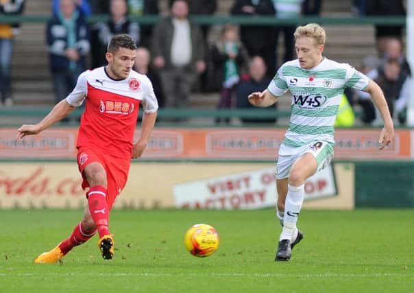 AJ Leitch-Smith, right, in action for Yeovil against Fleetwood.