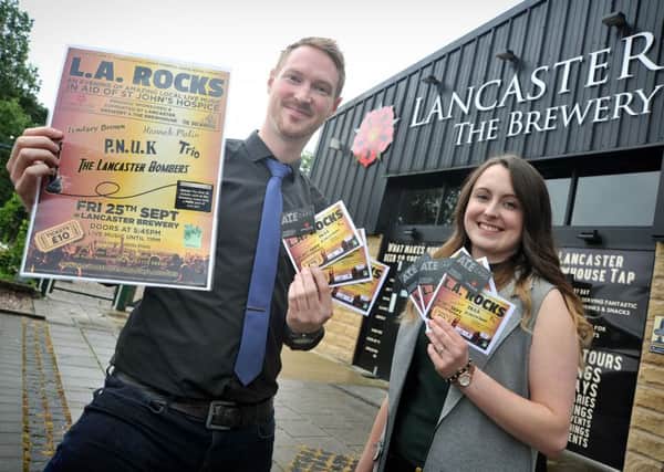 Annie Wood is organising a concert at Lancaster Brewery to raise funds for the hospice after her gran died there. Annie and Brewery Tap Manager Chris Duffy with tickets and flyers for the concert.  PIC BY ROB LOCK 27-7-2015