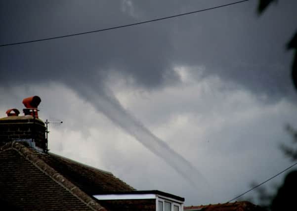 This picture of a  strange funnel shaped cloud formation spotted over Morecambe was taken by reader Sarah Alderson.