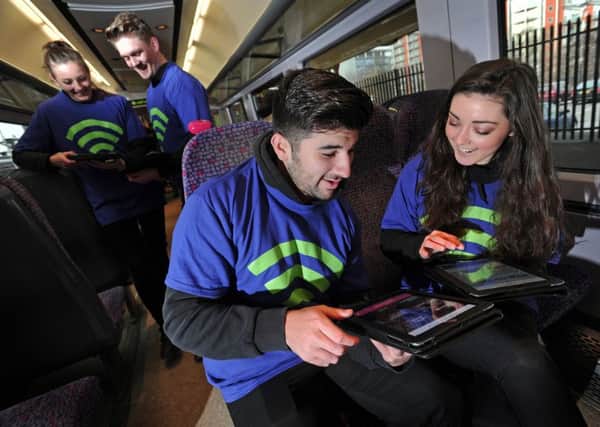 Northen Rail WiFi Launch on the Leeds - Bradford Line.  Pictured at Leeds City Station are  Eliza Whitaker, Sam Day,  James Hussain and Hollie Medlock..  Picture Bruce Rollinson