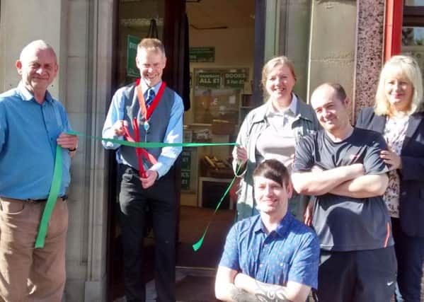 Mayor of Lancaster Jon Barry with staff and volunteers at the hospice's charity store opening.