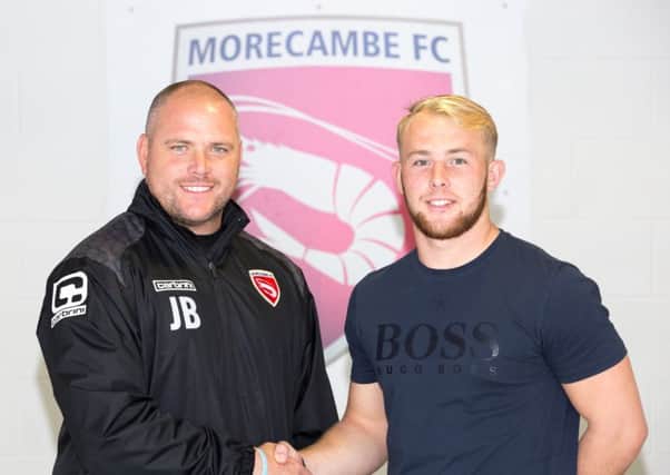 Jim Bentley welcomes new signing Tony Thompson to the Globe Arena.
