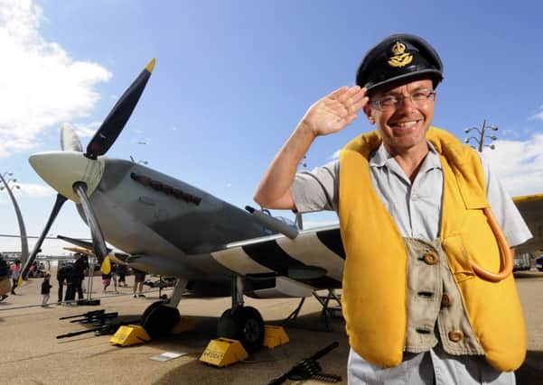 Blackpool Airshow on Monday.  Wayne Hemmingway poses by a Spitfire.
