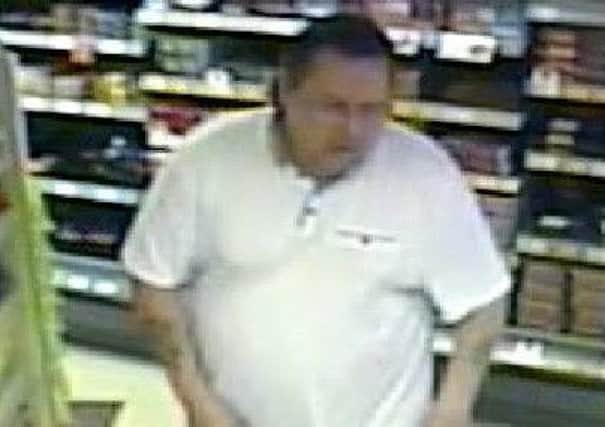 Police want to speak to this man after a theft from Booths in Torrisholme.
