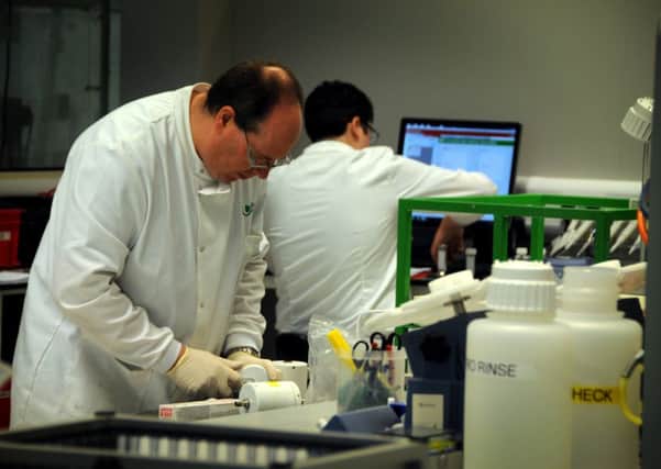 Scientists in the testing labs of the United Utilities HQ in Great Sankey, near Warrington