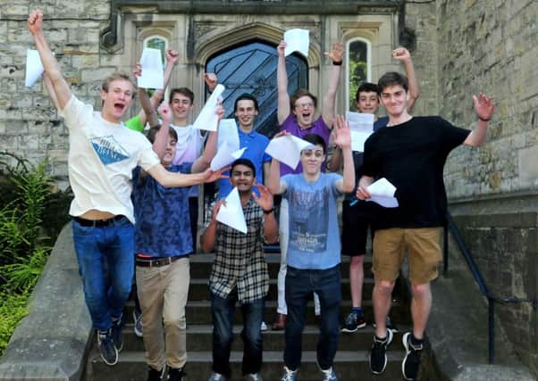 Lancaster Boys Grammer School students celebrate their A level results. Photo: David Hurst