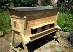 The Lancaster Long Hive designed by Dr Fred Ayres and built by Vincent Smally. It is designed for disabled members and others who need an easier access to the hive.