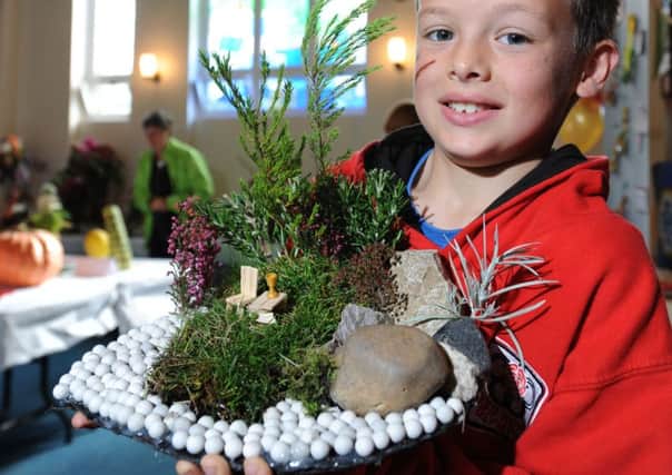 Penwortham Autumn Show
: George Bates,10, with his 1st prize winning miniature garden