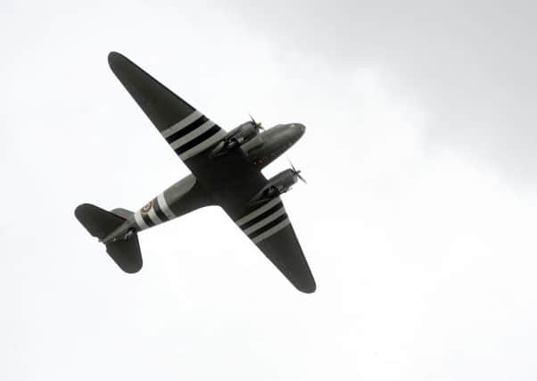 A Dakota plane flies over Morecambe during a previous fly-past.