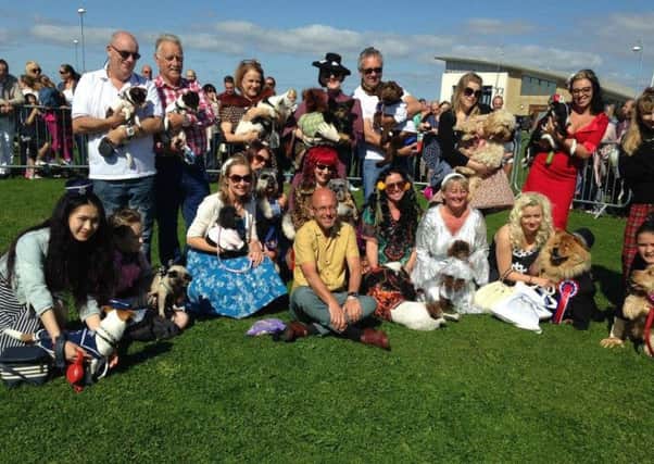 Wayne Hemingway (seated centre) with the finalists of the Pooch Parade at Morecambe Vintage-by-the-Sea last weekend.