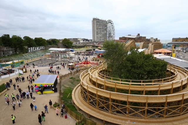 The Grade II*-listed, timber-framed Scenic Railway at Dreamland Amusement Park in Margate, Kent, as crowds flocked to the reopening of the seaside amusement park following a 12-year campaign and an £18 million restoration. PRESS ASSOCIATION Photo. Picture date: Friday June 19, 2015. Attractions include more than 17 restored vintage rides, a roller disco, pleasure gardens, restaurants, arcades and amusements, harking back to a golden age of the British seaside. Gareth Fuller/PA Wire