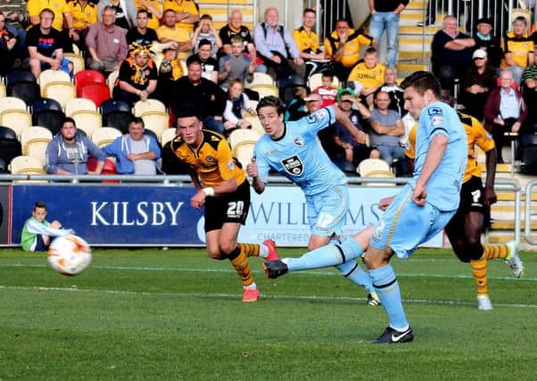 Paul Mullin converts from the spot to hand Morecambe victory at Newport.