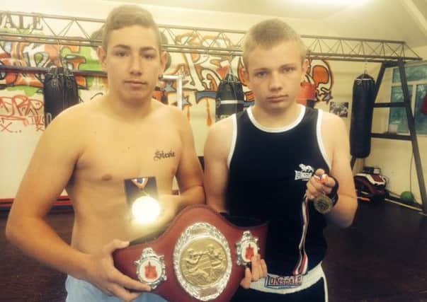Skerton ABC's Lewis Marshall and Luke Gudgeon with their North West titles.