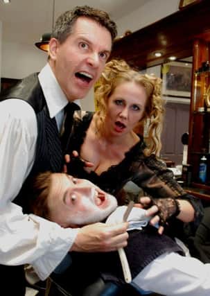 Barber Ryan Wallace getting a close shave from Sweeney Todd and Mrs Lovett.