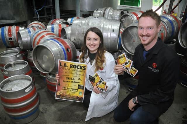 Annie Wood is organising a concert at Lancaster Brewery to raise funds for the hospice after her gran died there.
Annie and Brewery Tap Manager Chris Duffy with tickets and flyers for the concert.  PIC BY ROB LOCK
27-7-2015