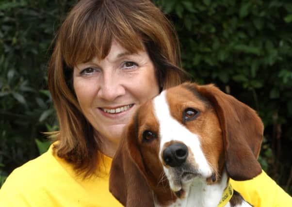 Droopy the Bassett cross cavalier PAT (Pets As Therapy) and owner Julie Norris from Morecambe regularly go into Trumacar Primary School to read with the children.
5th October 2015